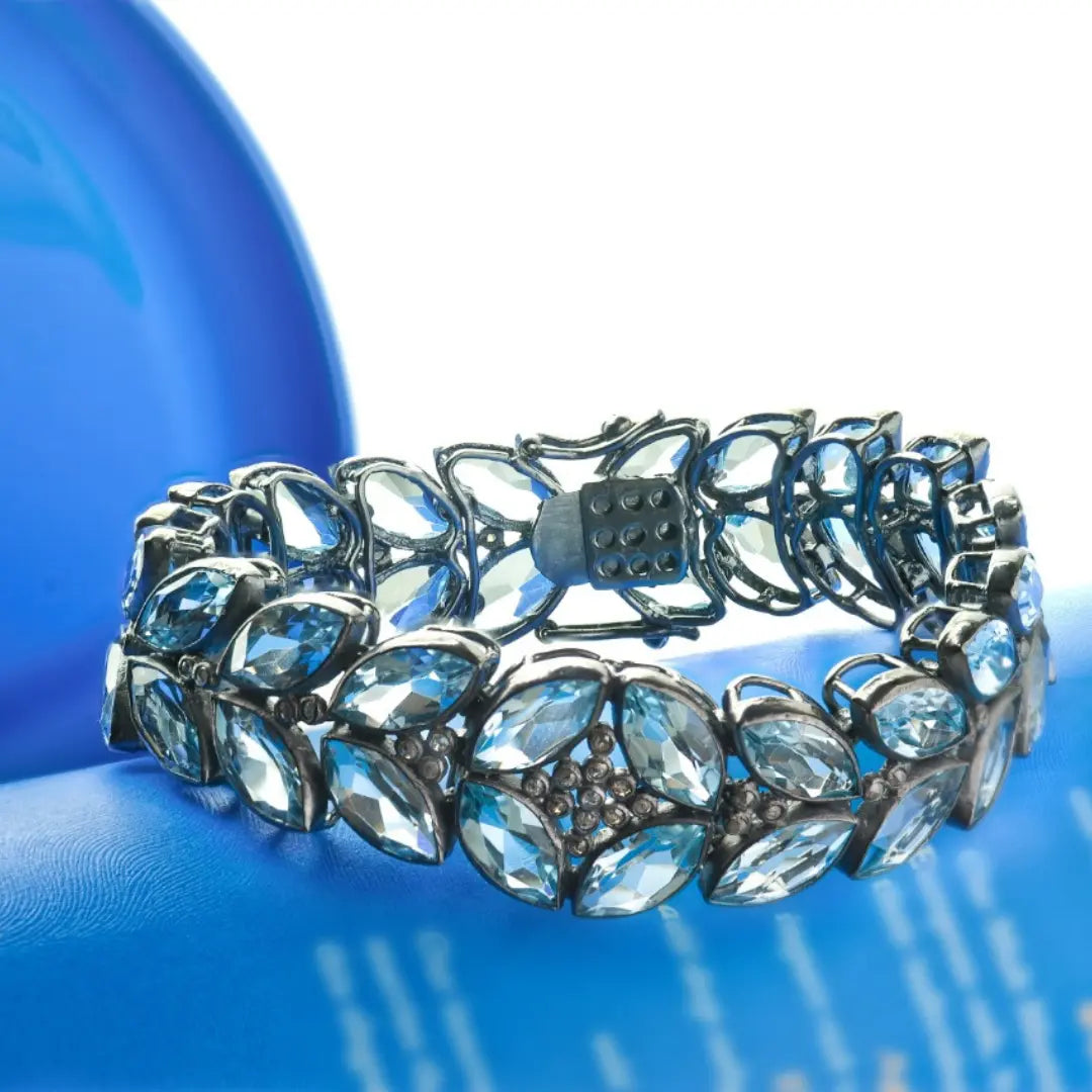 Exquisite Blue Topaz & Diamond Floral Bracelet – A Statement of Luxury Antiqa Handcrafted