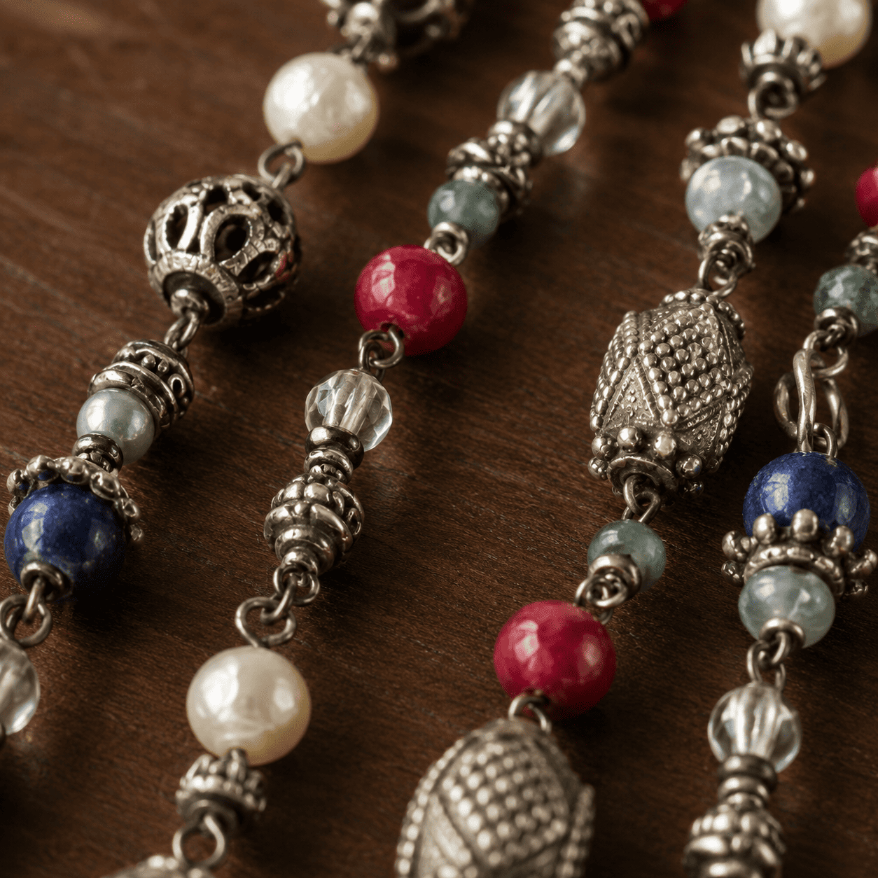Artisan crafted 30 inch sterling silver statement necklace with ruby lapis lazuli aquamarine and pearls