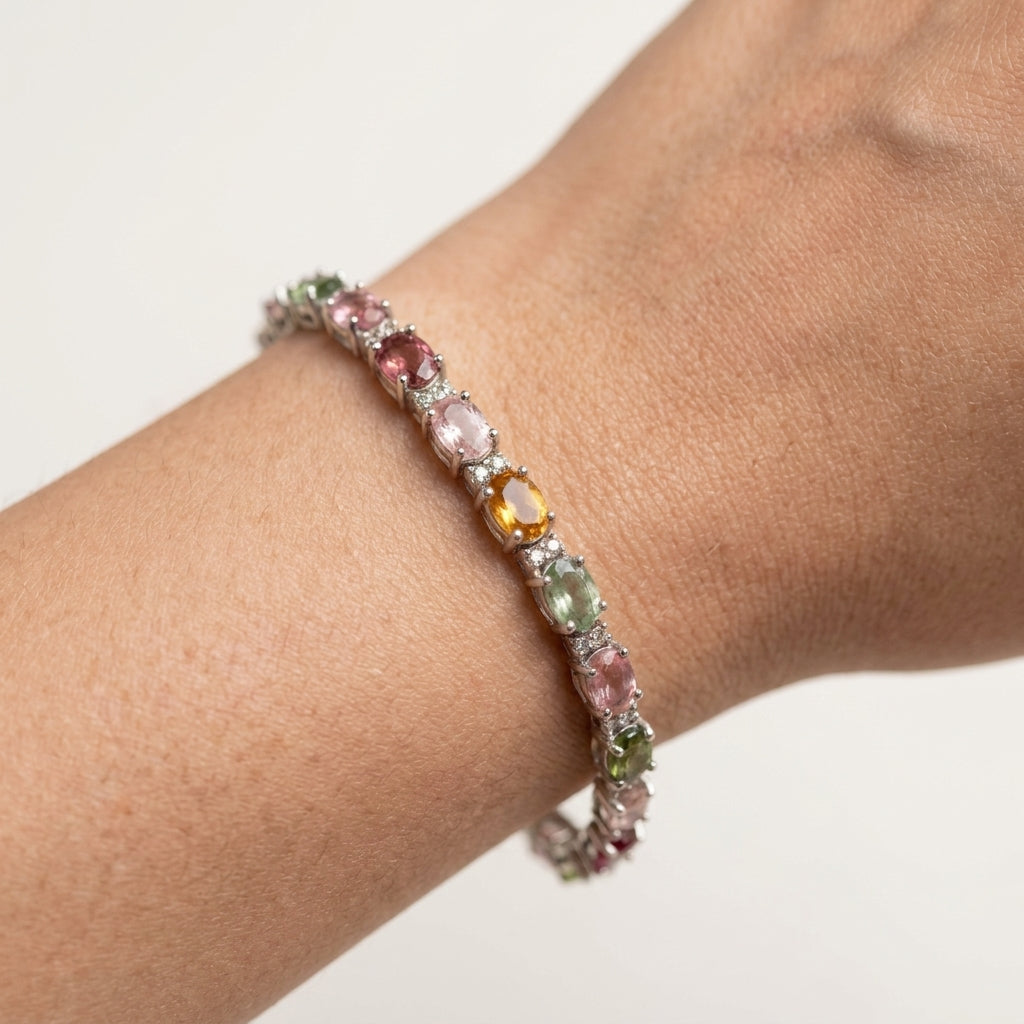 Close up of multi color tourmaline bracelet with sparkling diamonds
