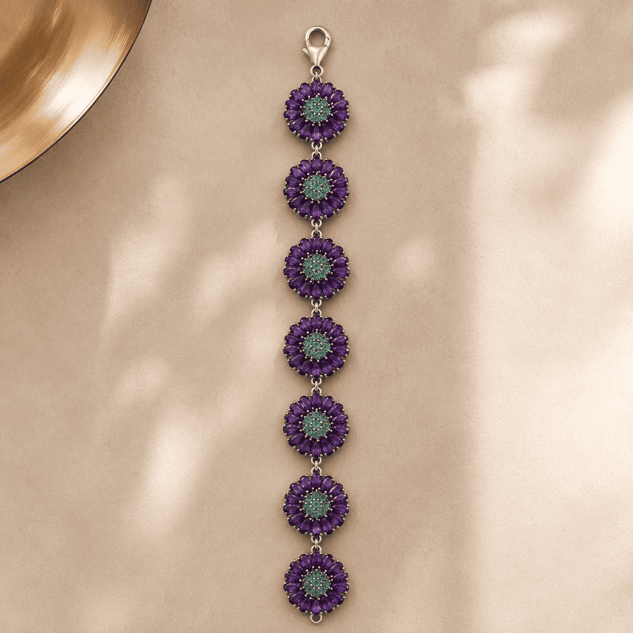 Handcrafted sterling silver bracelet with African amethyst and Zambian emerald gemstones front view