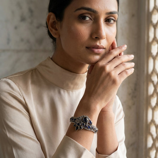 Sterling silver bangle with Thailand sapphires and diamond accents