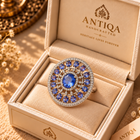 Saucer Shaped Tanzanite Statement Ring with Diamonds